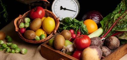 a wooden box filled with lots of different types of vegetables